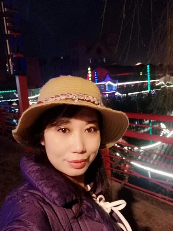阳光明媚的第一张照片--郑州相亲服务中心